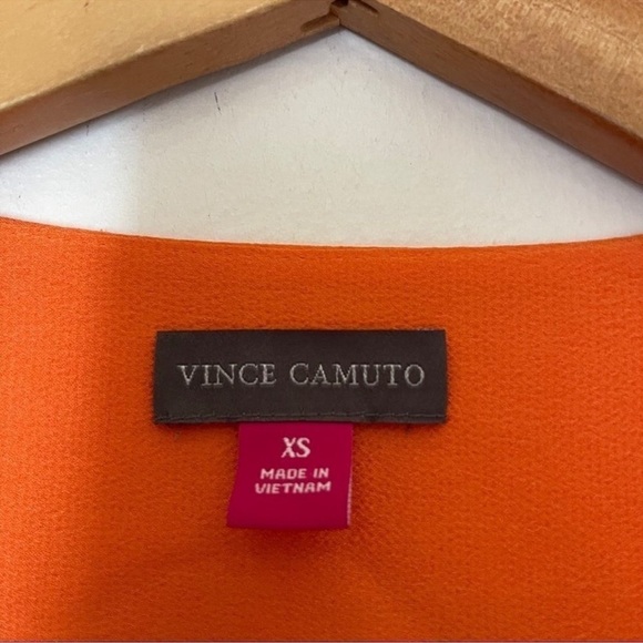 Vince Camuto Faux wrap Top Blouse size XS runs bigger
Electric Orange - Picture 4 of 8